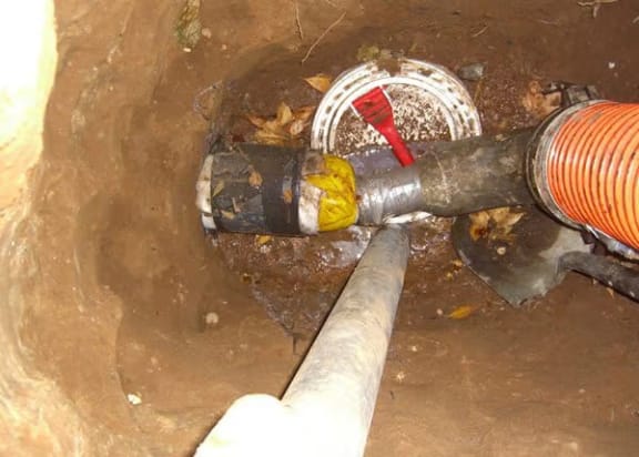 Close up of broken drain pipe